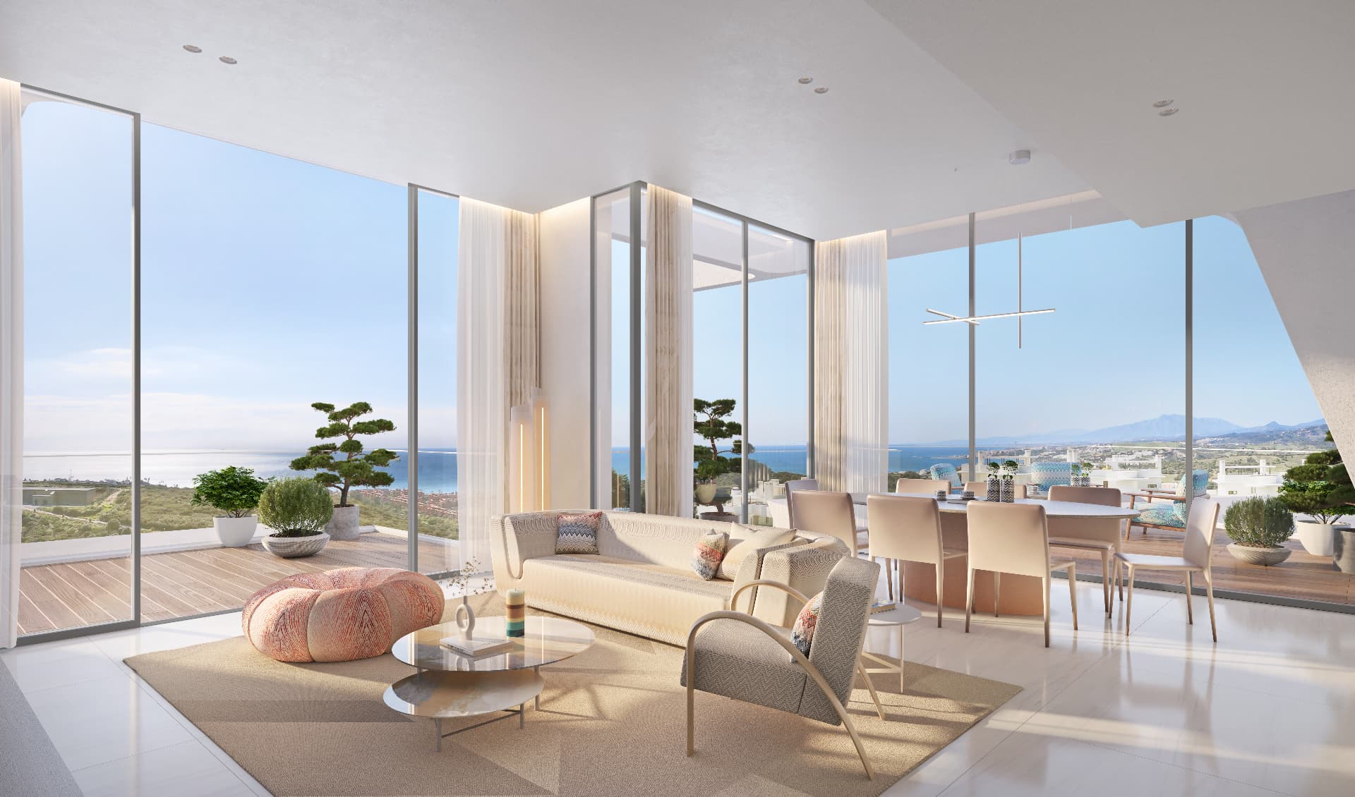 Bright luxury living room with floor-to-ceiling sea views